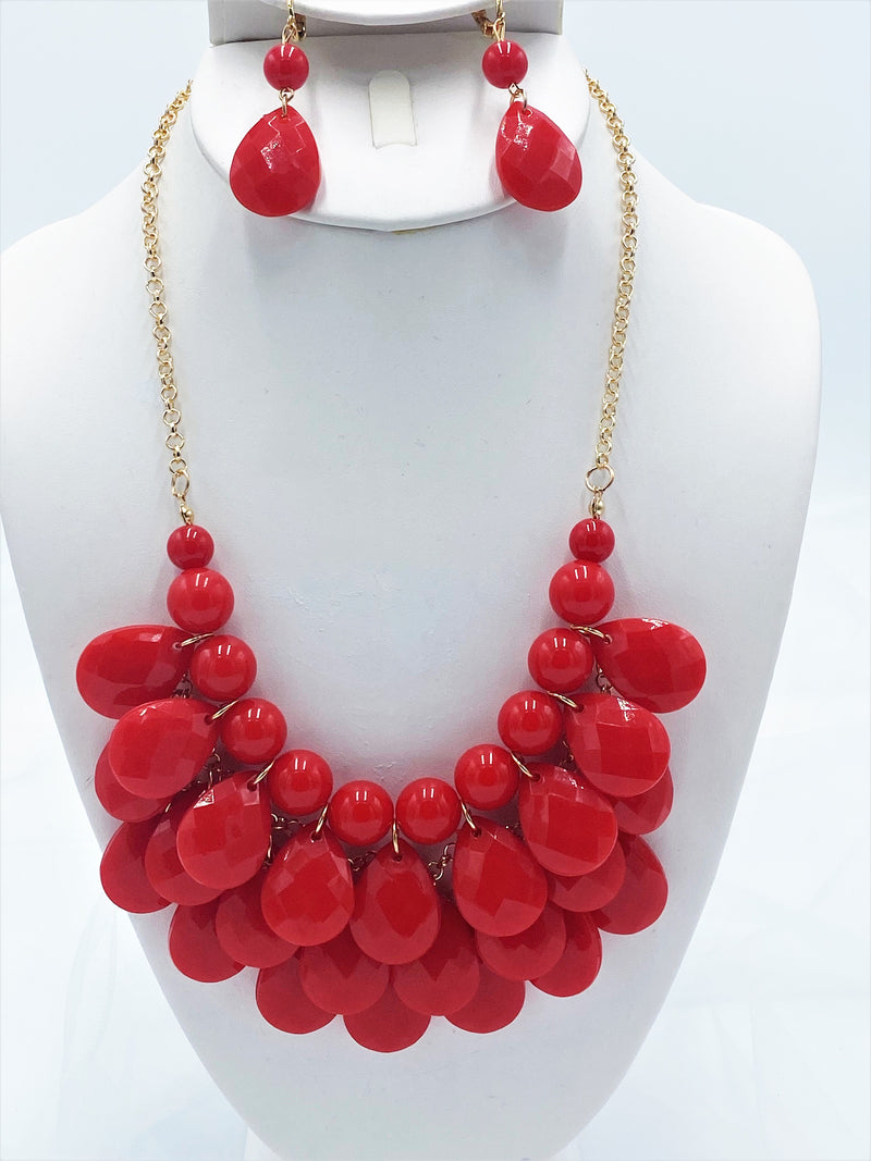 Clip on gold chain and red teardrop bead necklace and earring set