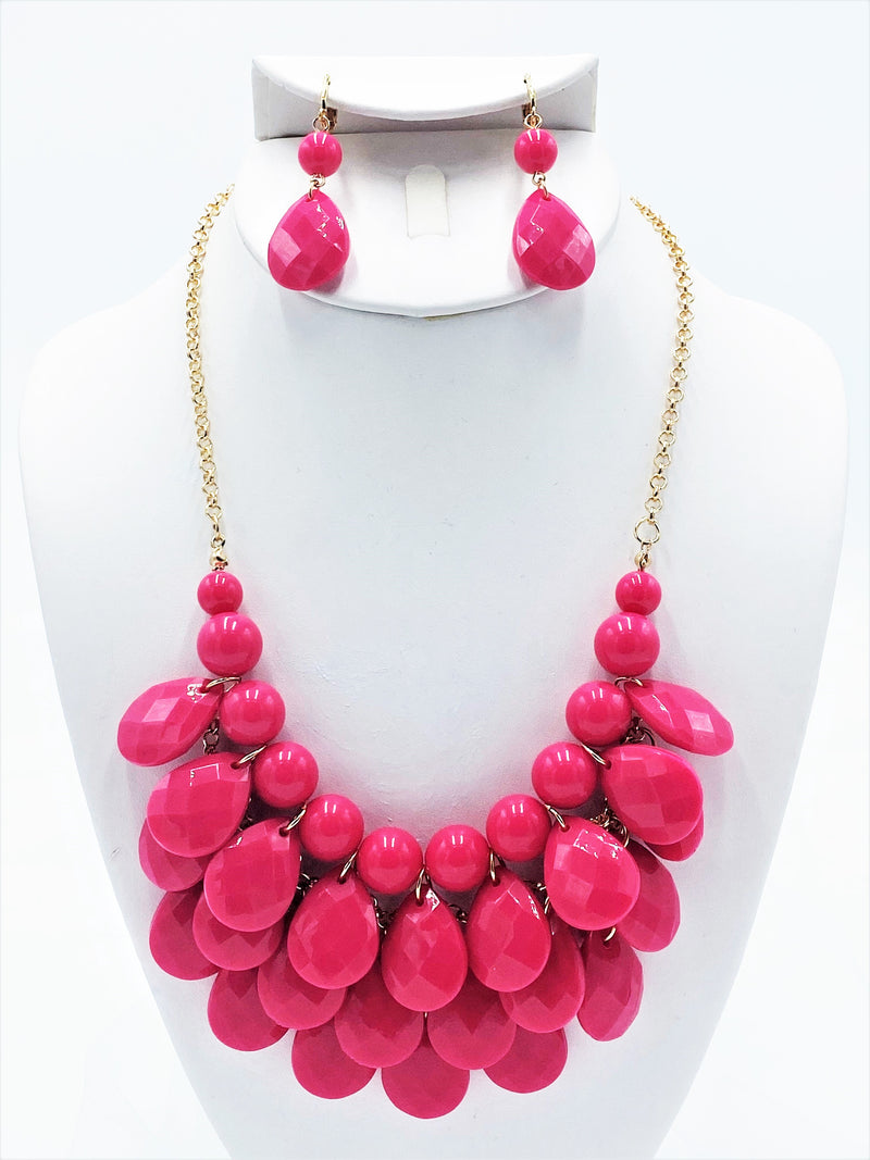 Clip on gold chain and pink teardrop bead necklace and earring set
