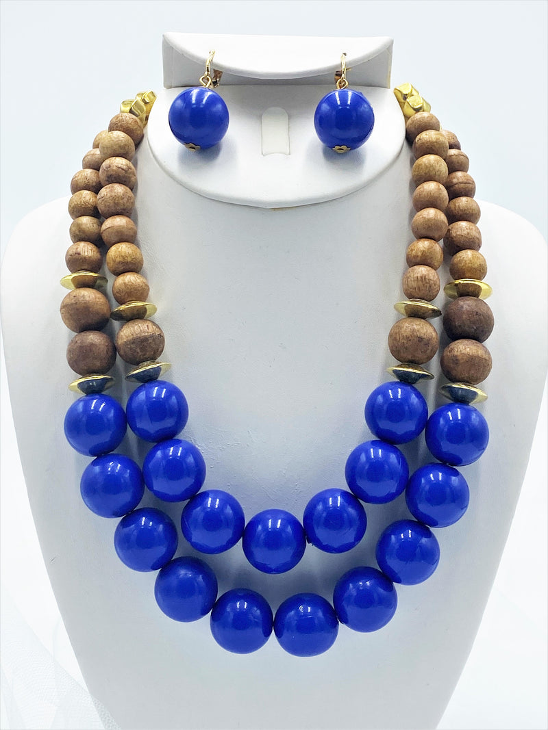 Clip on gold multi strand, wood, and blue bead necklace and earring set