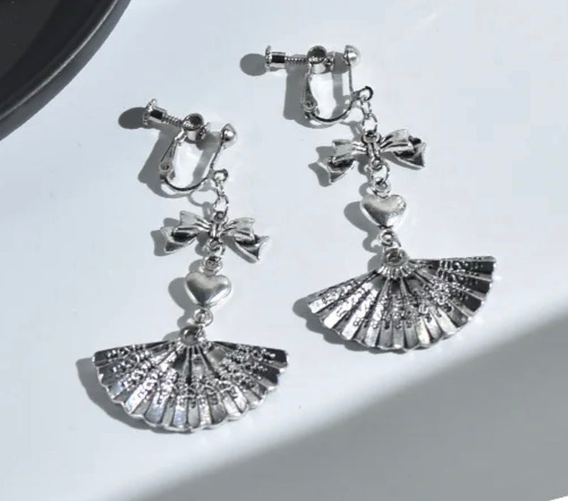 Vintage 2 3/4" clip on silver bow, heart and fan dangle earrings