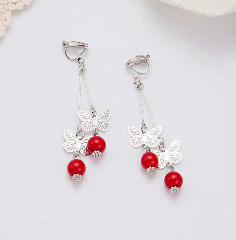 Clip on 2 3/4" silver and red bead dangle butterfly earrings
