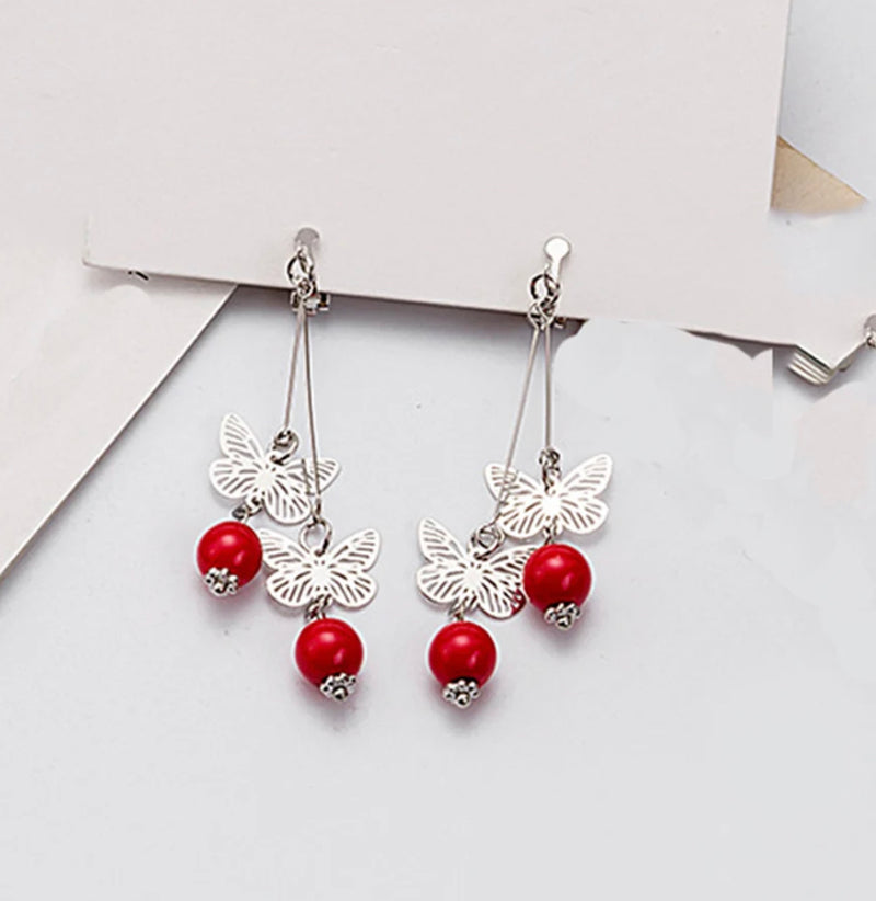 Clip on 2 3/4" silver and red bead dangle butterfly earrings