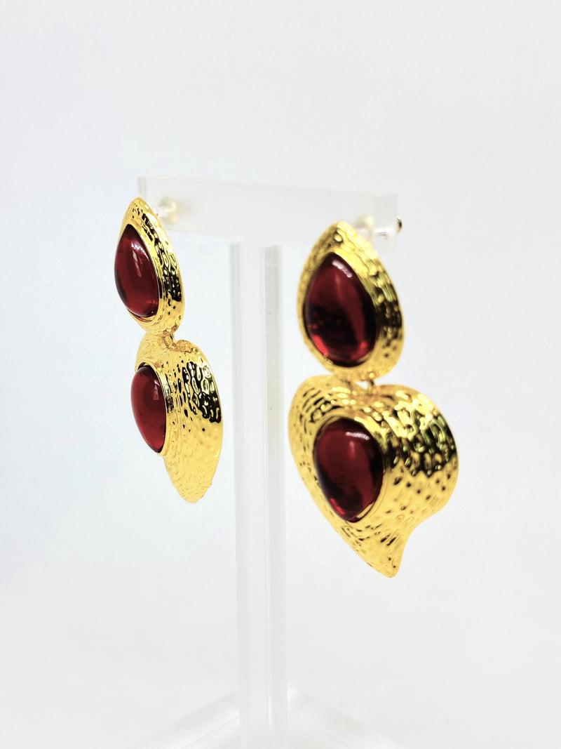 Pierced 2 1/2" textured gold and red stone dangle heart earrings