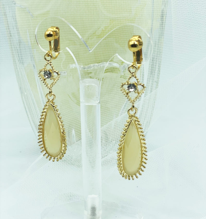 Clip on 2 3/4" gold and off white stone long teardrop earrings w/clear stone