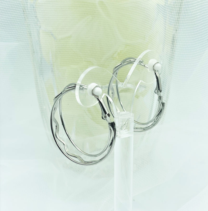 Clip on 1 1/2" silver straight and zig zag center hoop earrings