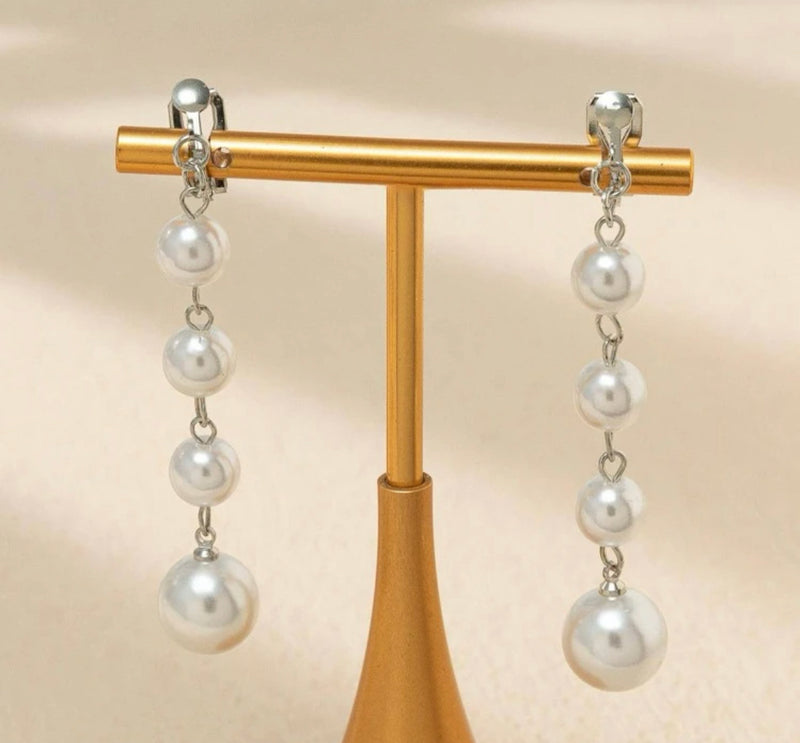 Clip on 2 3/4" silver and white pearl dangle earrings