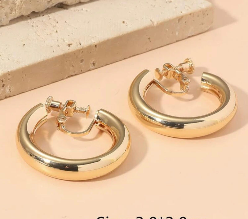 Trendy 1 1/2" clip on shiny gold open back hollow center hoop earrings