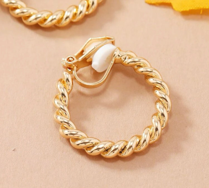 Trendy 1" clip on gold twisted hoop earrings
