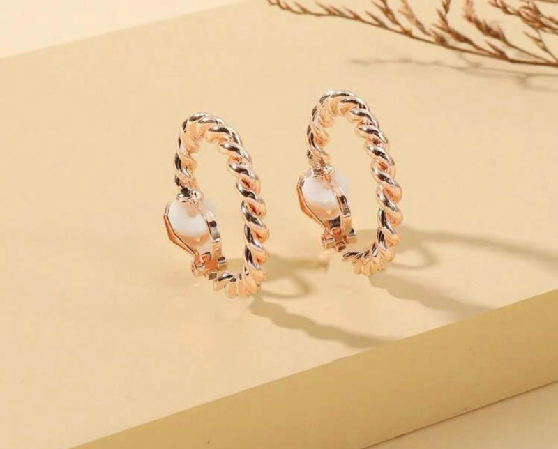 Trendy 1" clip on rose gold twisted hoop earrings