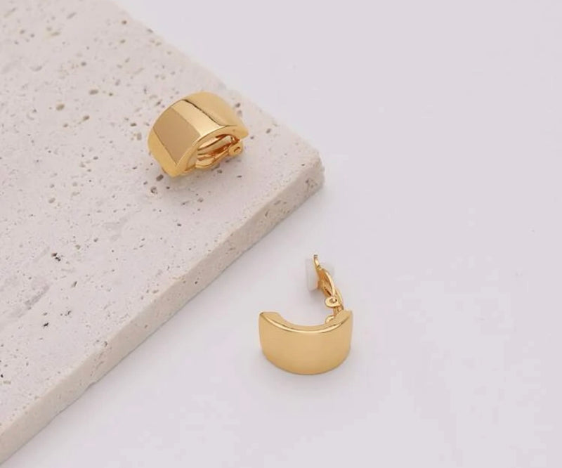 Clip on 3/4" shiny gold wide button style earrings