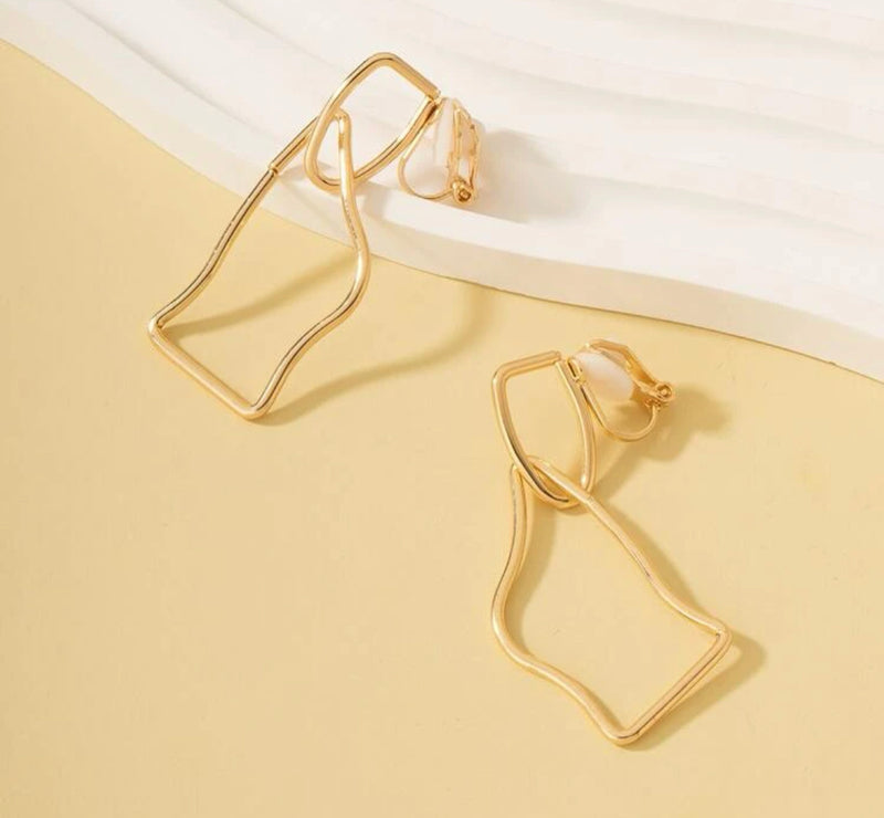 Clip on 2 1/4" gold or silver odd shaped dangle earrings