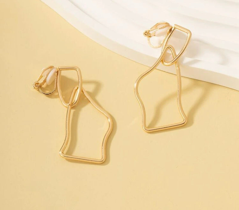 Clip on 2 1/4" gold or silver odd shaped dangle earrings