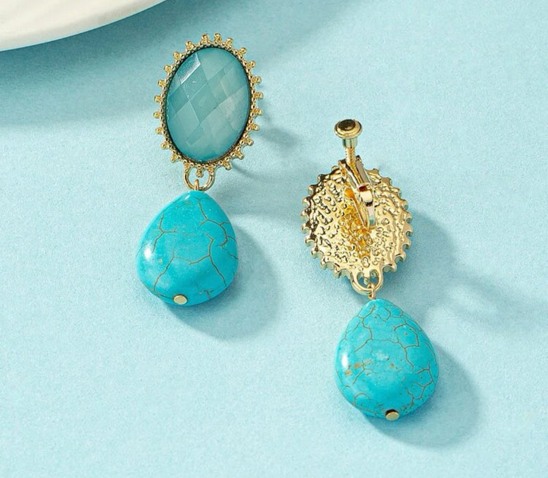 Clip on 2 1/4" gold and turquoise stone earrings with dangle turquoise bead