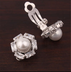 Clip on small silver and white pearl earrings with straight clear stone edge