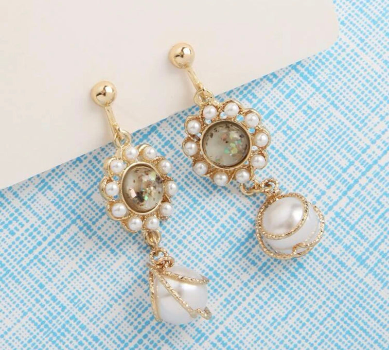 Clip on 2" gold and white pearl earrings with gold glitter stone