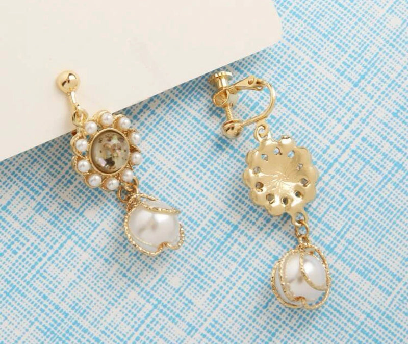 Clip on 2" gold and white pearl earrings with gold glitter stone