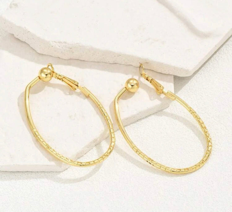 Clip on 2" gold textured and shiny U shaped hoop earrings