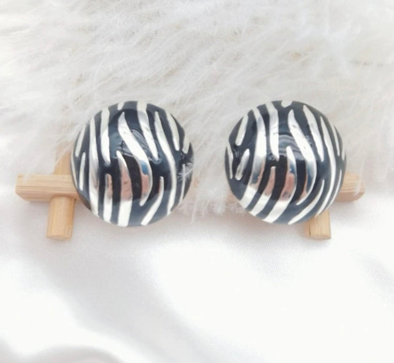 Clip on 1 1/4" silver and black animal print button style earrings
