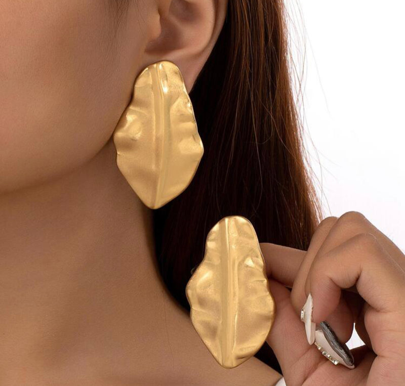 Clip on 2 1/4" matte gold odd shaped pinched center earrings