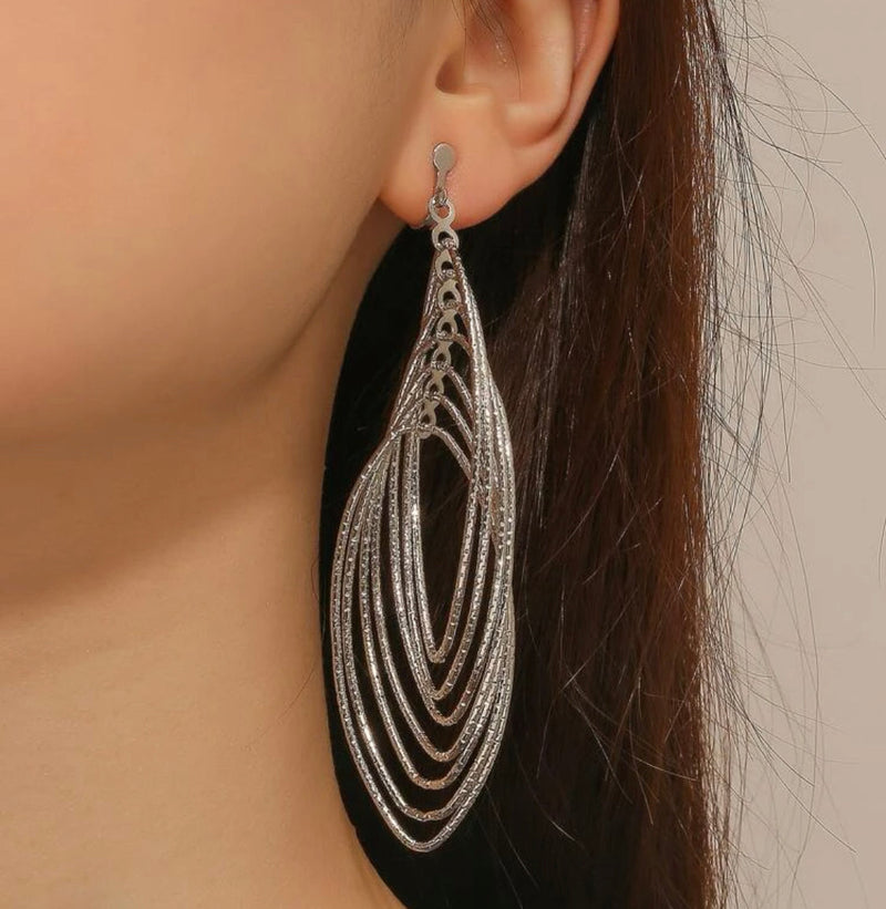 Clip on 3 3/4" textured silver dangle multi layered pointed earrings