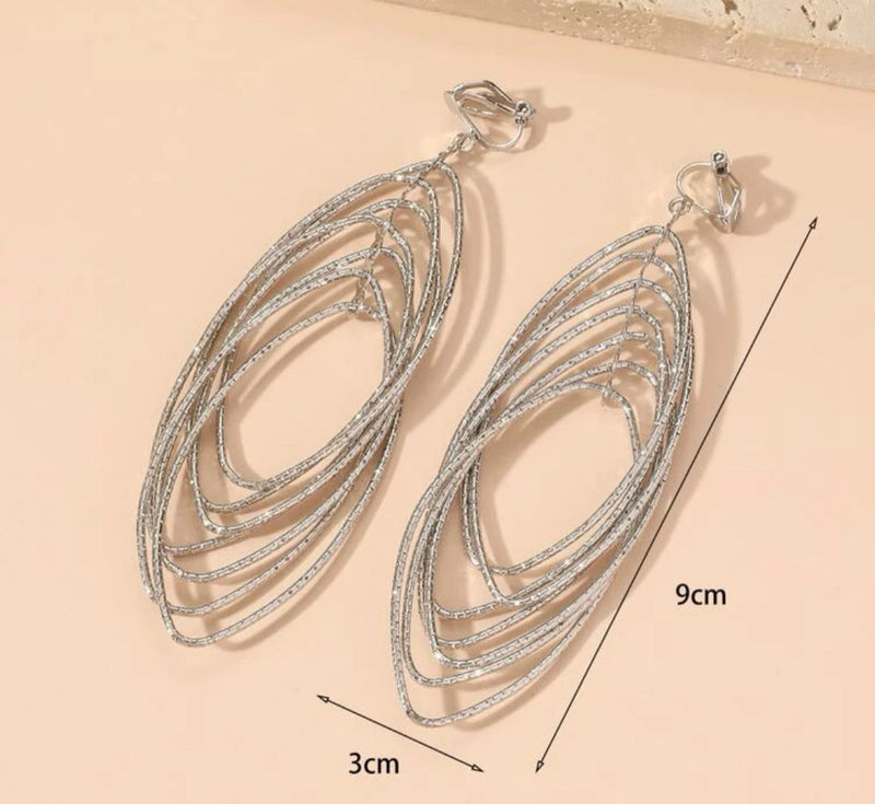 Clip on 3 3/4" textured silver dangle multi layered pointed earrings