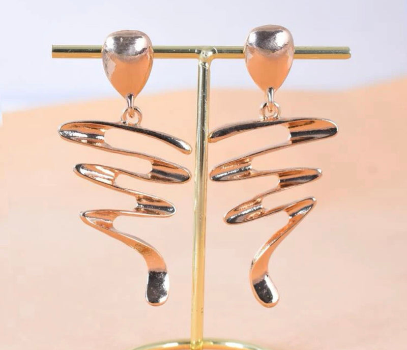 Trendy 2 3/4" clip on gold zig zag dangle earrings