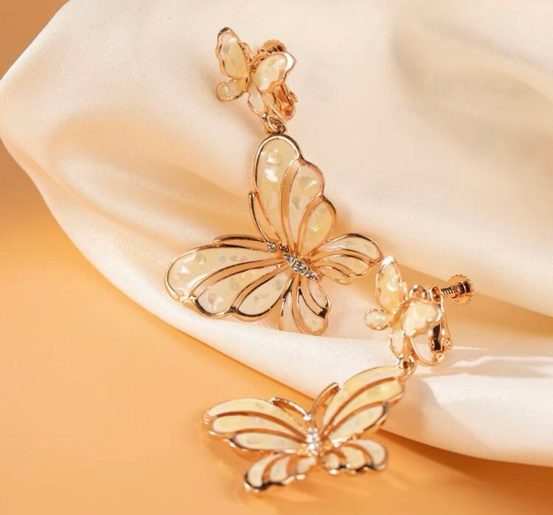 Clip on 2 1/4" rose gold, yellow cutout double butterfly earrings