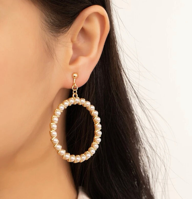 Clip on 2 3/4" gold and white pearl dangle hoop earrings w/cutout edges