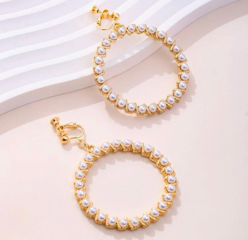 Clip on 2 3/4" gold and white pearl dangle hoop earrings w/cutout edges