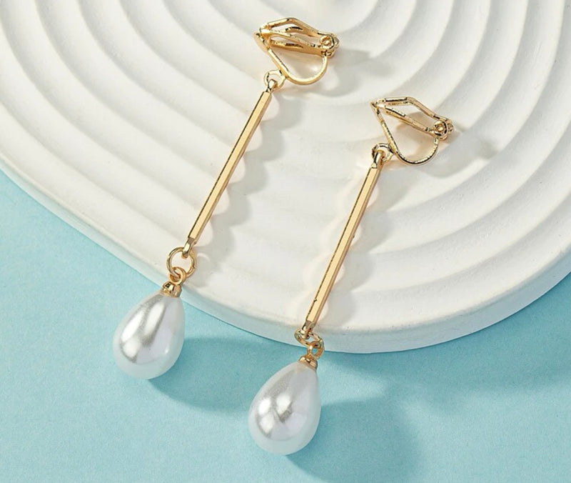 Clip on 2 1/4" gold stick white pearl teardrop dangle earrings