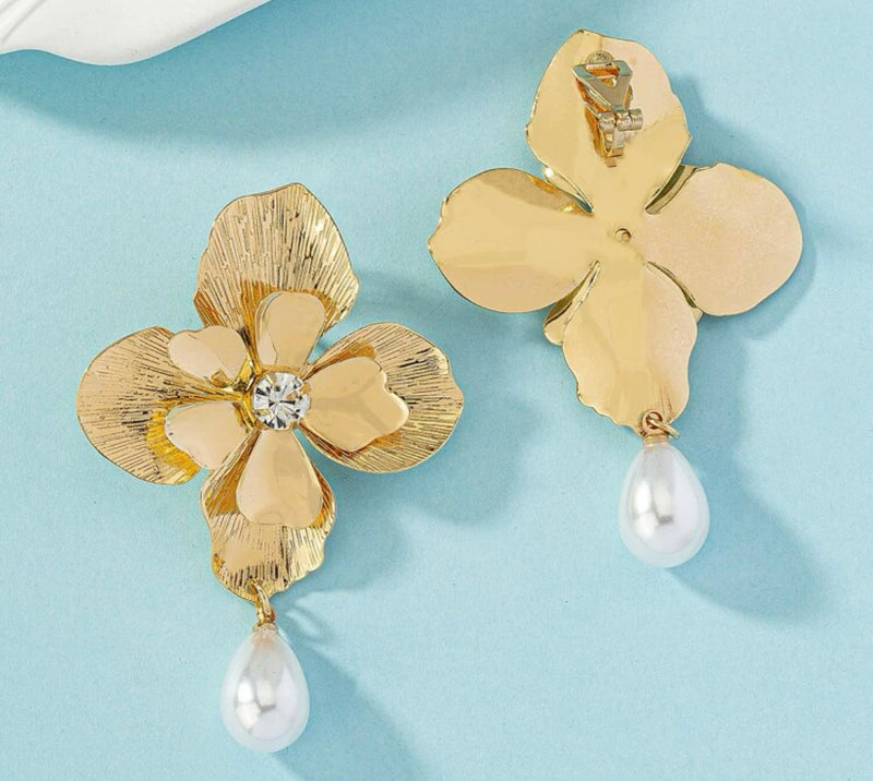 Clip on 2 1/2" shiny gold flower earrings w/teardrop & clear stone