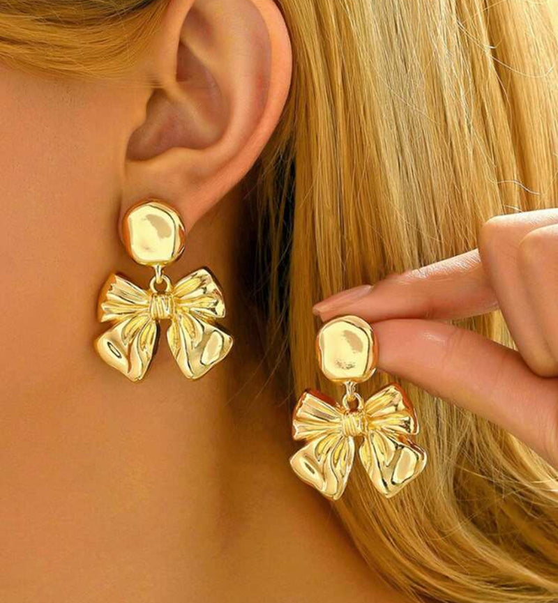 Clip on 1 3/4" large gold dangle hammered bow earrings