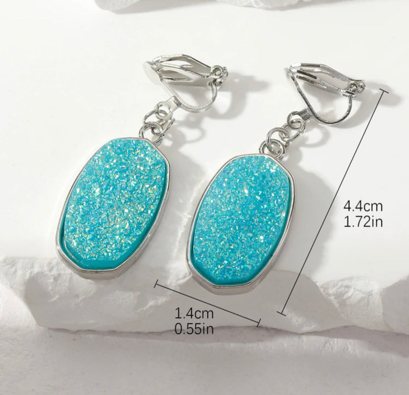 Clip on 1 1/2" silver and turquoise glitter dangle earrings