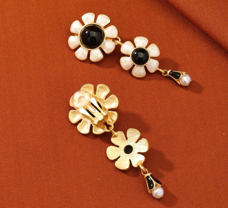 Clip on 2 3/4" matte gold, cream & black flower earrings w/dangle pearl