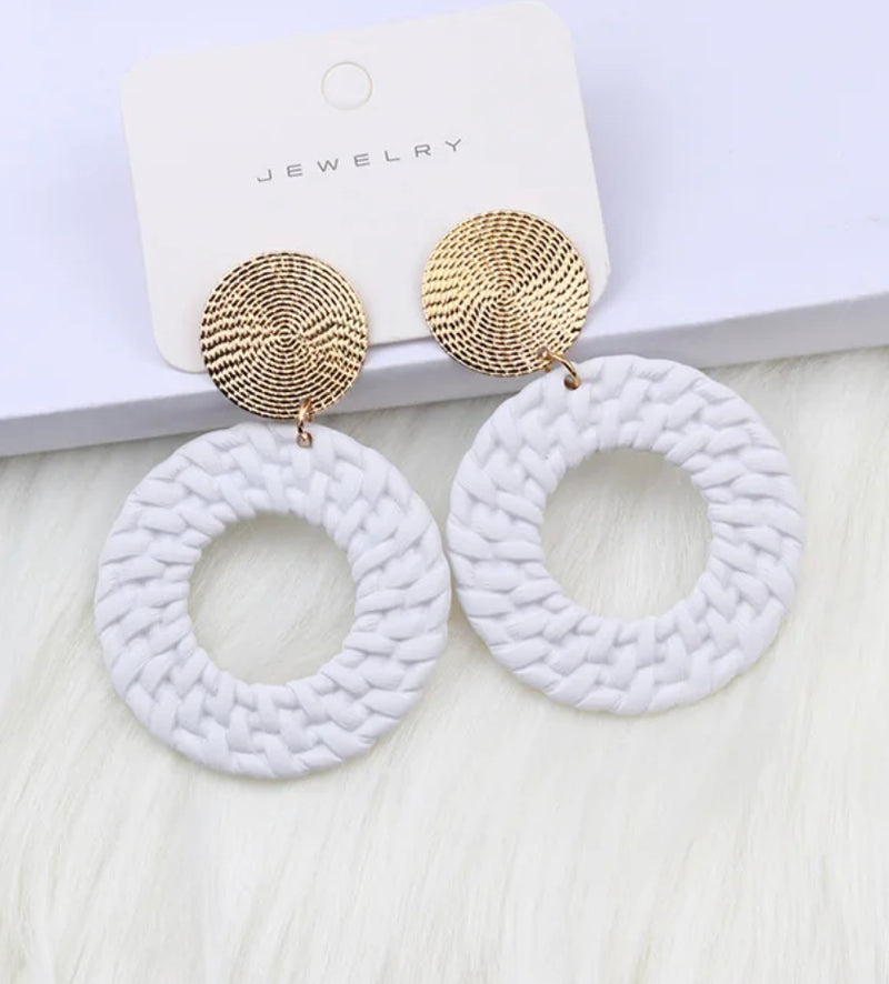 Clip on 2 1/2" gold woven hoop earrings in a variety of colors