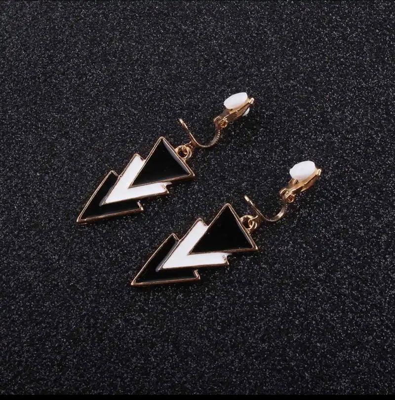 Clip on 1 3/4" gold, black and white pointed dangle earrings