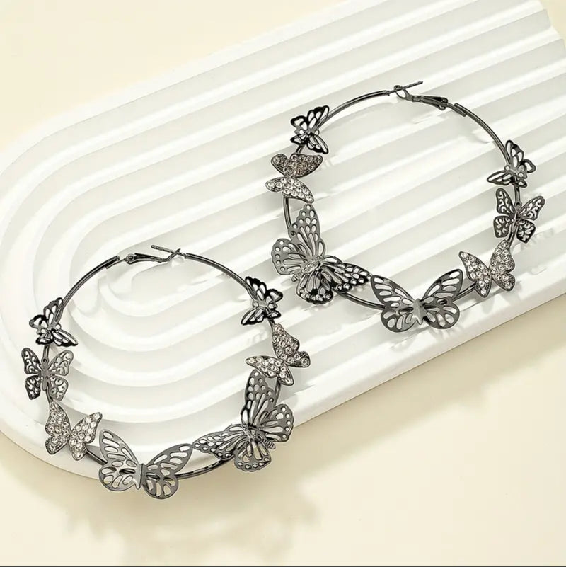 Trendy gunmetal pierced 2 3/4" large butterfly hoop earrings with clear stones