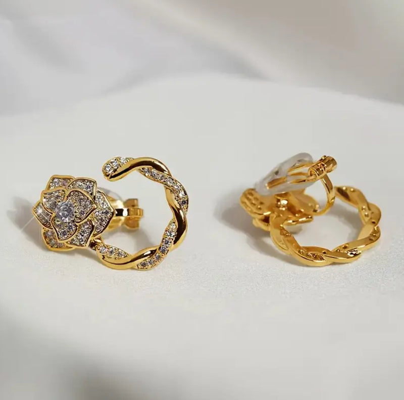 Clip on 1" gold and clear stone flower open hoop earrings