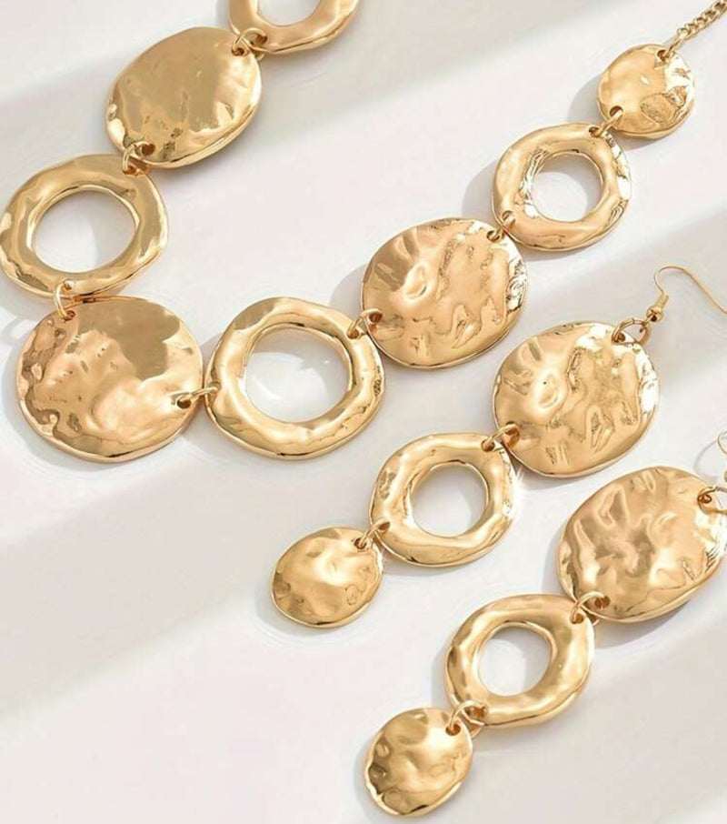 Pierced gold hammered odd shaped round and cutout necklace set