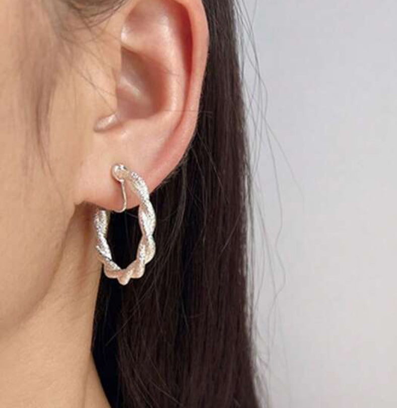 Comfort fit 1 1/4" clip on shiny textured gold twisted dangle hoop earrings