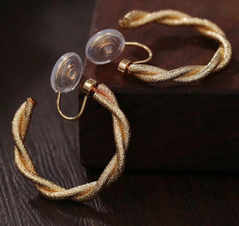 Comfort fit 1 1/4" clip on shiny textured gold twisted dangle hoop earrings