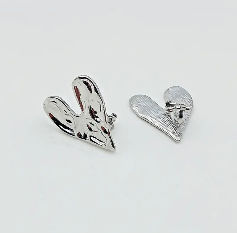 Clip on 1 1/4" shiny silver wrinkled heart button style earrings