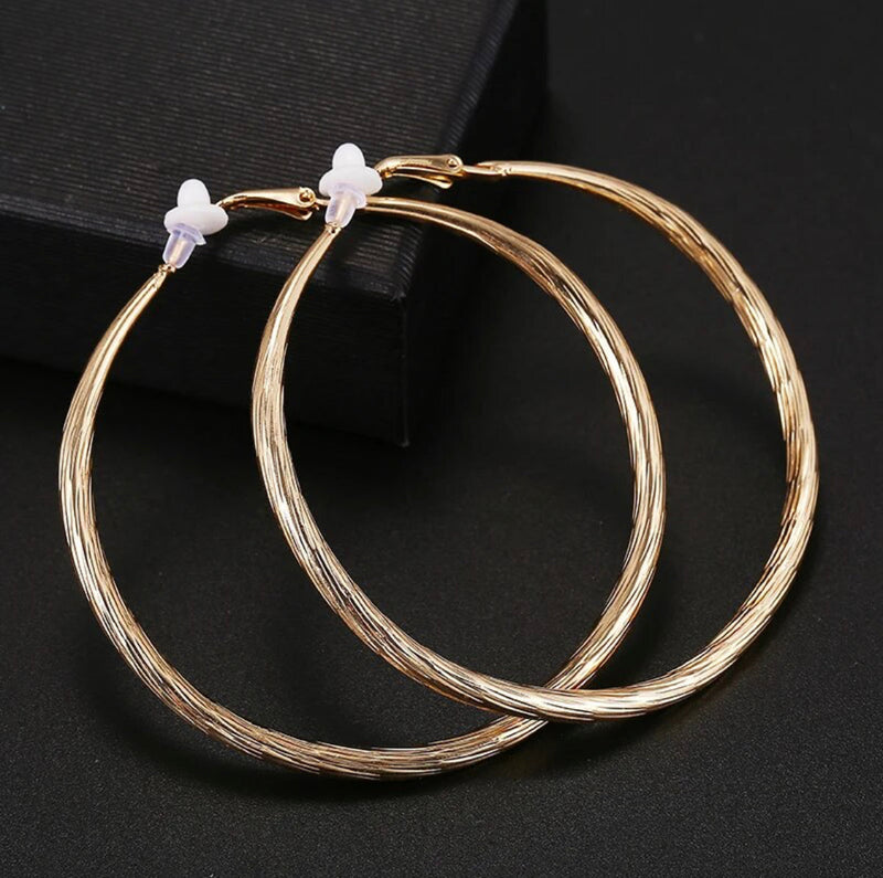 Clip on 2 3/4" gold textured twisted XL hoop earrings