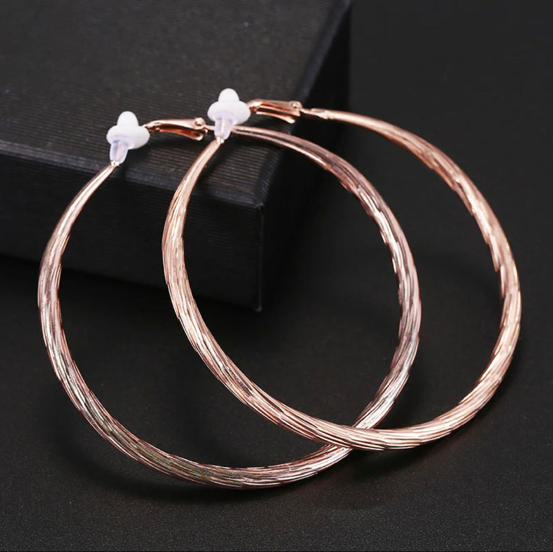 Clip on 2 3/4" rose gold textured twisted XL hoop earrings (Copy)