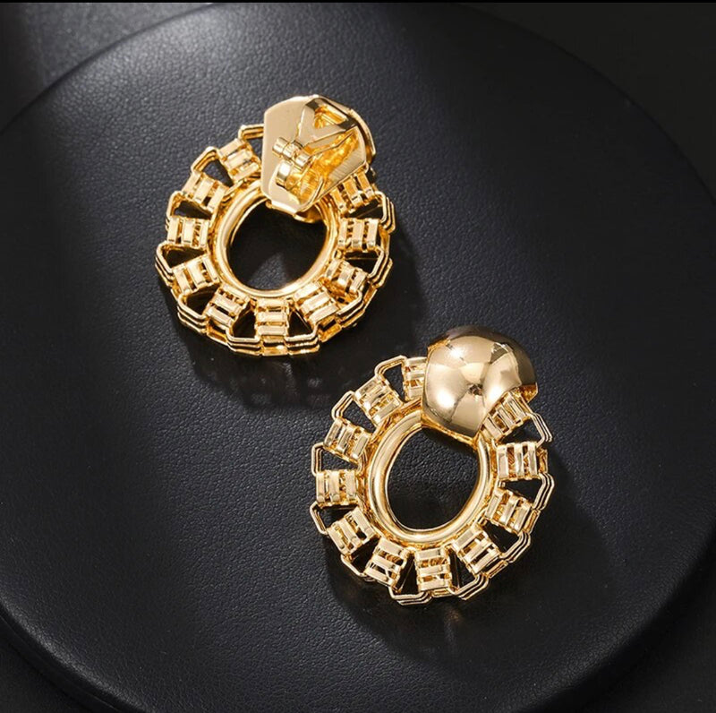 Clip on 1 1/2" gold cutout block style edge round earrings