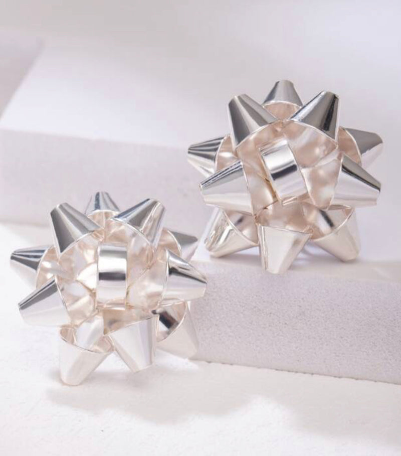 Clip on 1" shiny silver Christmas Bow button style earrings
