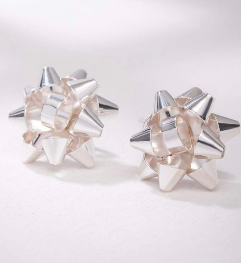 Clip on 1" shiny silver Christmas Bow button style earrings