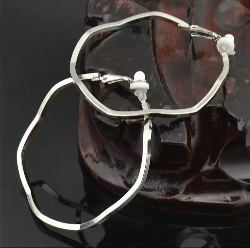 Unique Clip on 2 1/4" silver wavy hoop earrings