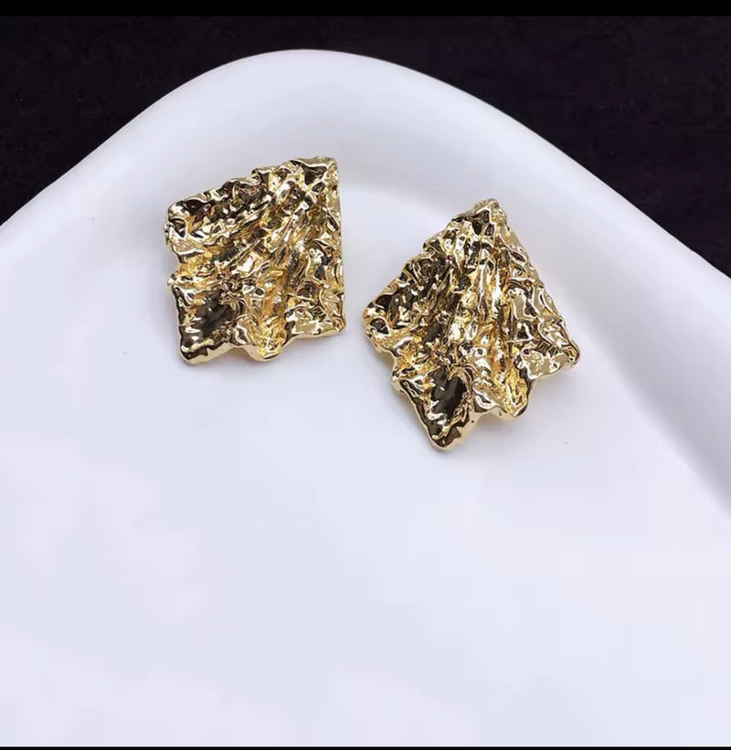 Clip on 1 1/2" wrinkled gold pointed edge button style earrings
