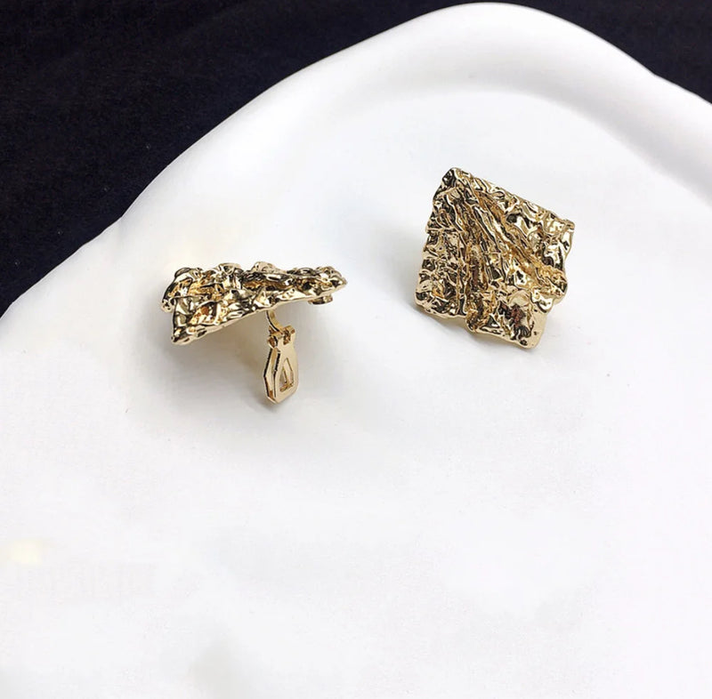 Clip on 1 1/2" wrinkled gold pointed edge button style earrings